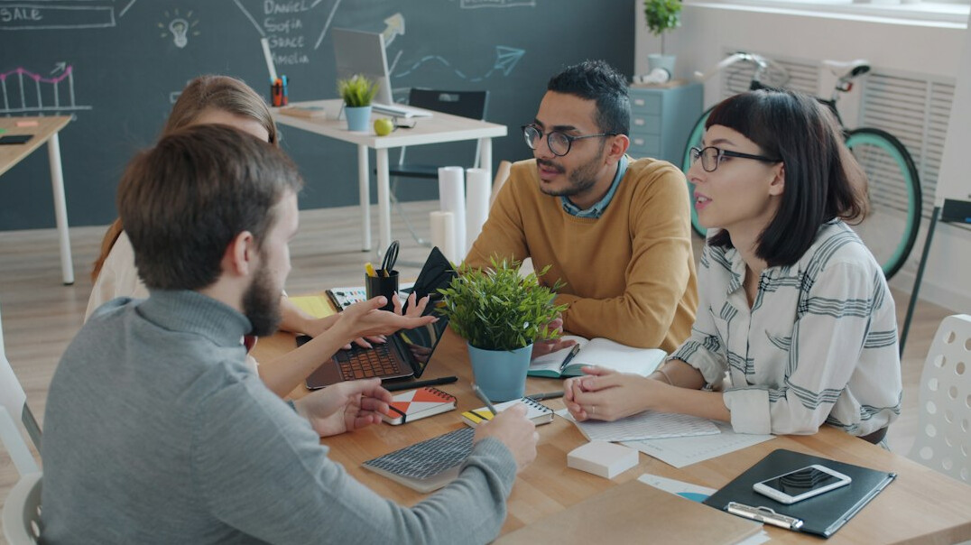 team of developers discussing