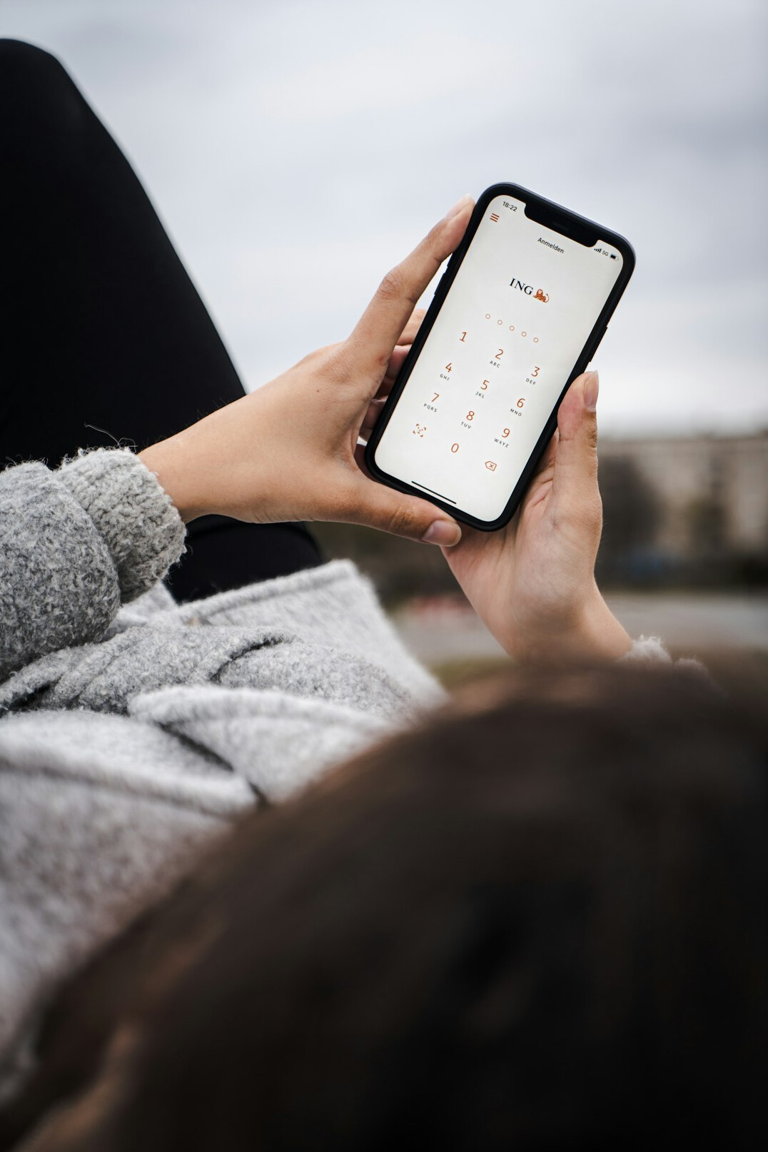 person using insurance app