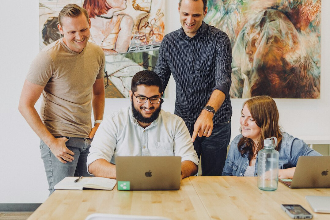 team discussing software